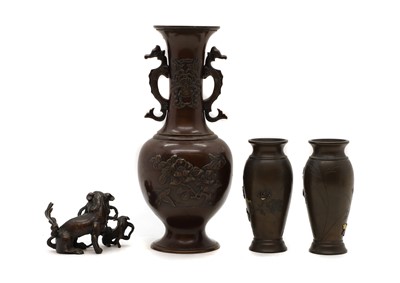 Lot 76 - A group of Japanese plum bronze vases