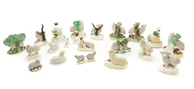 Lot 113 - A collection of Staffordshire pottery sheep