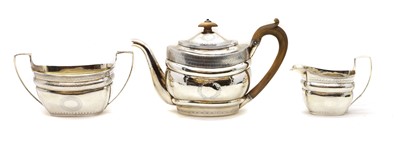 Lot 7 - A composed George III silver tea service