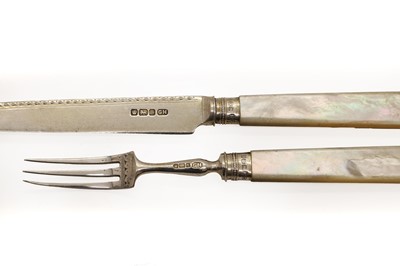 Lot 33 - A set of mother of pearl and silver fruit knives and forks