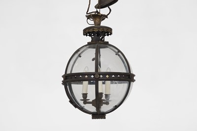 Lot 14 - A pair of bronze, gilt-brass and glass 'Pennington' globe lanterns by Jamb