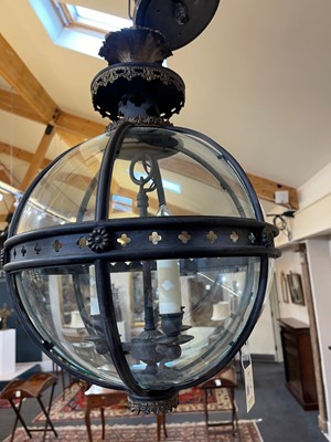 Lot 14 - A pair of bronze, gilt-brass and glass 'Pennington' globe lanterns by Jamb