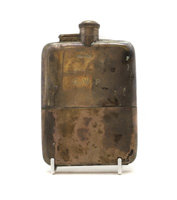 Lot 12 - A large silver hip flask
