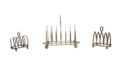 Lot 9 - A group of three silver toast racks