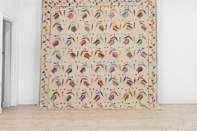 Lot 208 - A suzani-inspired flat-weave wool rug