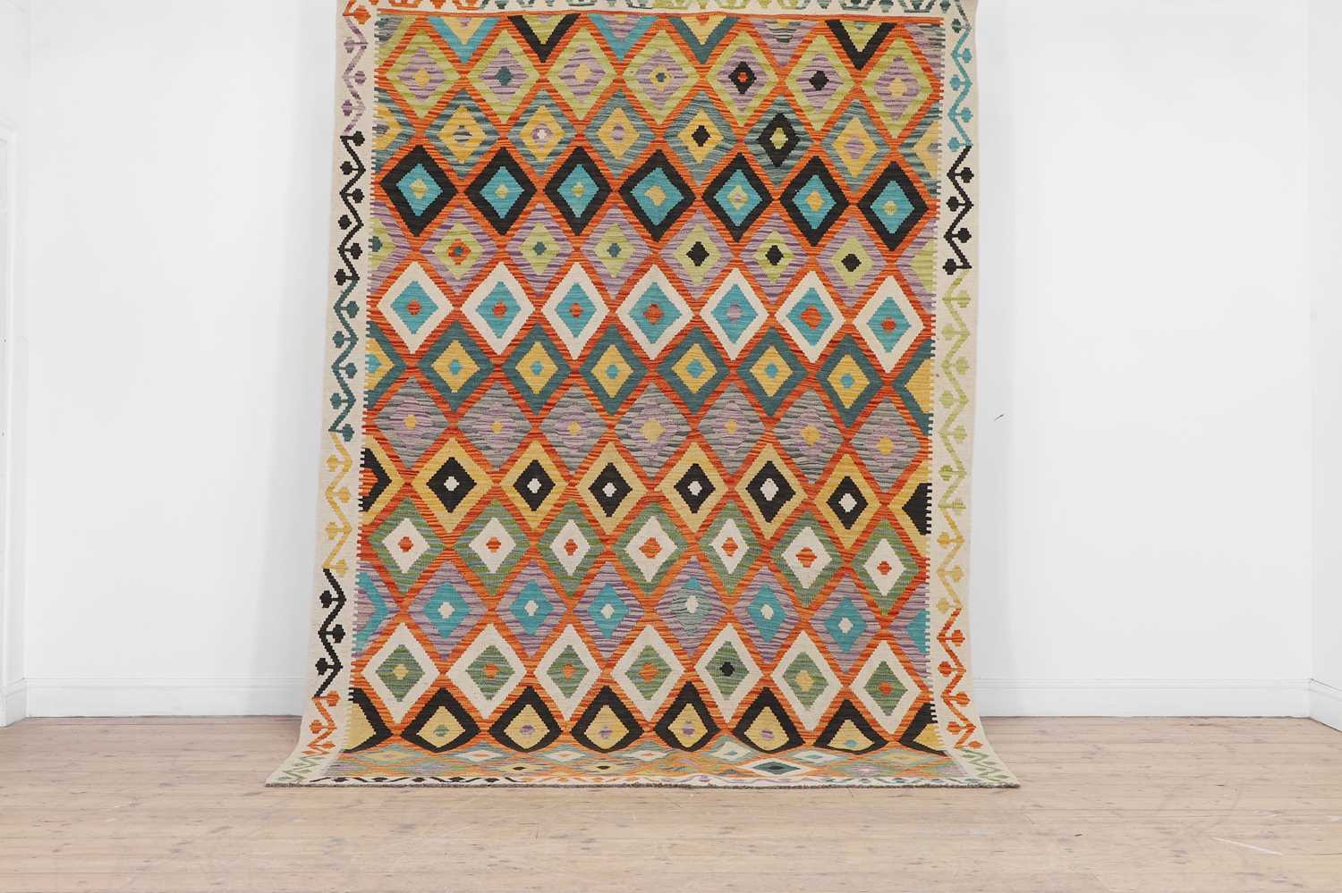 Lot 12 - A kilim flat-weave rug