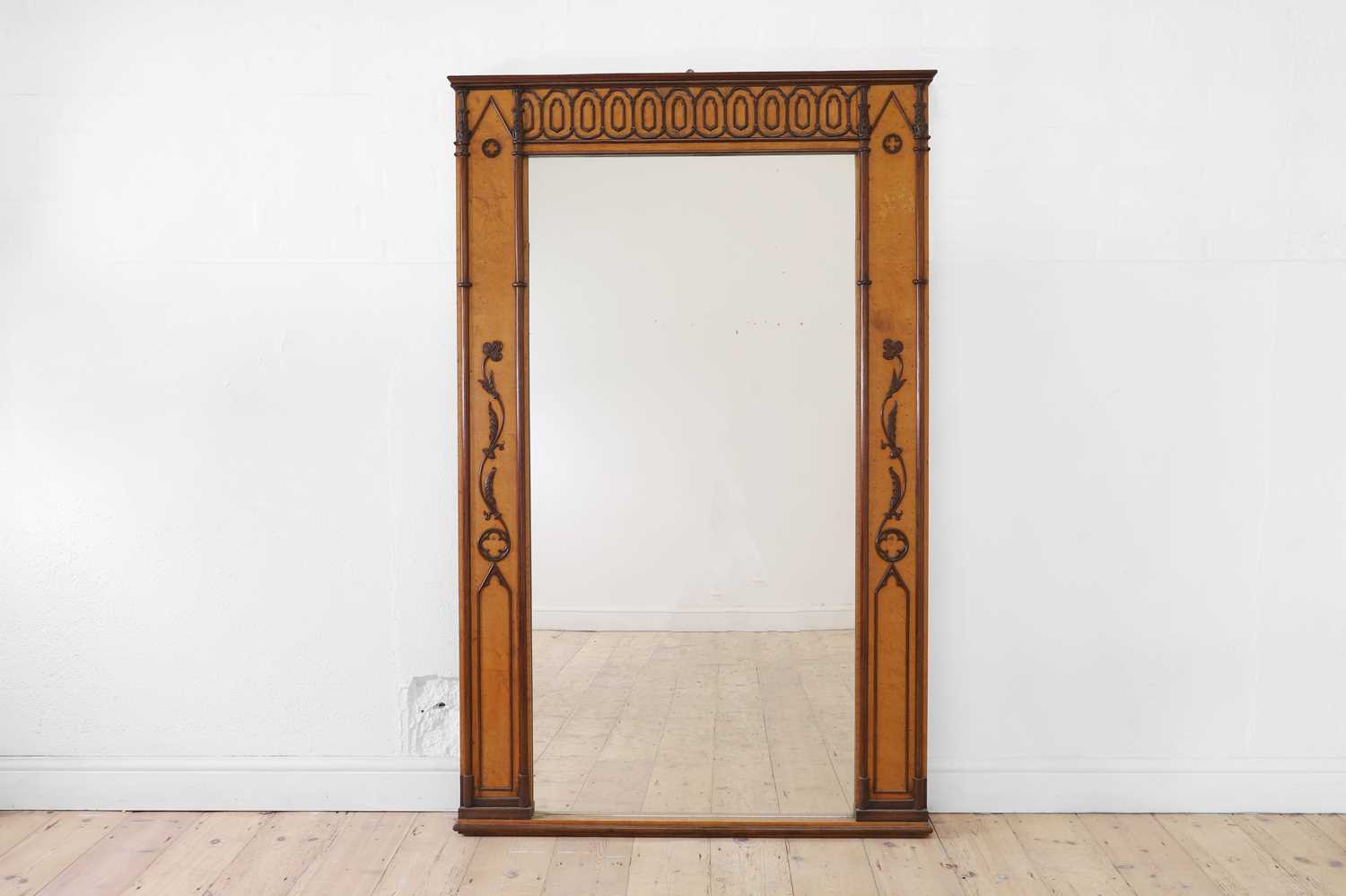 Lot 72 - A Gothic Revival maple mirror