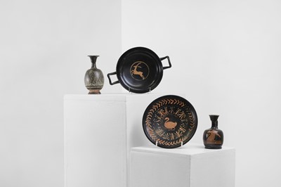 Lot 101 - A group of four Apulian pottery antiquities
