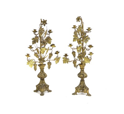 Lot 208 - A pair of gilt-metal candelabra