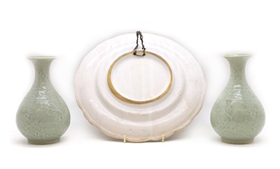 Lot 198 - A pair of Chinese celadon vases