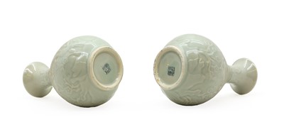 Lot 198 - A pair of Chinese celadon vases