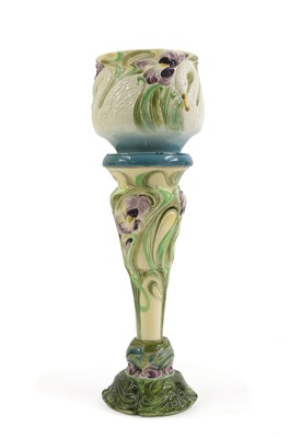Lot 250 - A Bretby pottery jardinière on stand