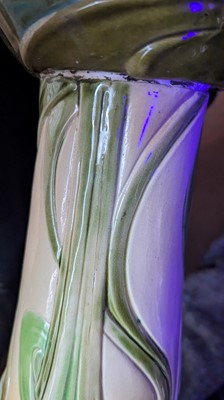Lot 250 - A Bretby pottery jardinière on stand