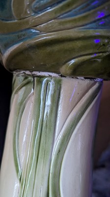Lot 250 - A Bretby pottery jardinière on stand