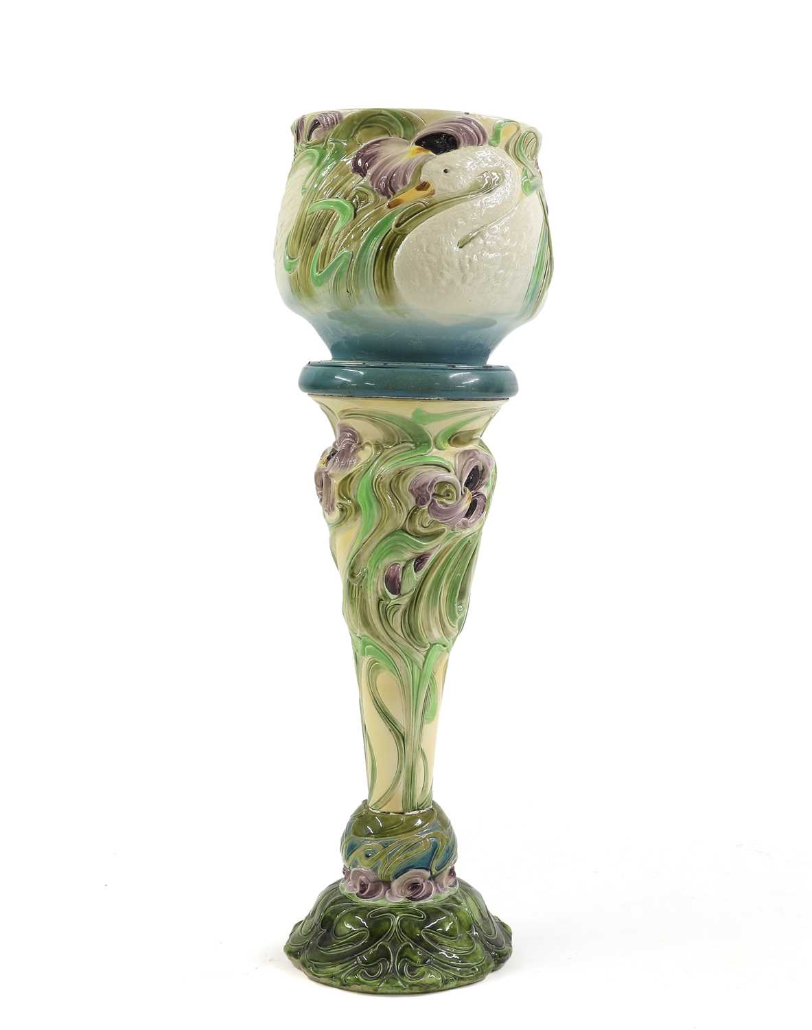 Lot 250 - A Bretby pottery jardinière on stand