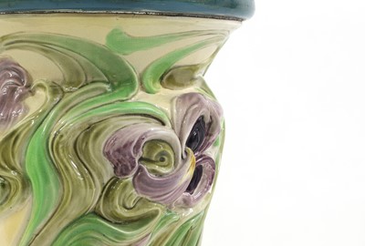 Lot 250 - A Bretby pottery jardinière on stand