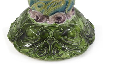 Lot 250 - A Bretby pottery jardinière on stand
