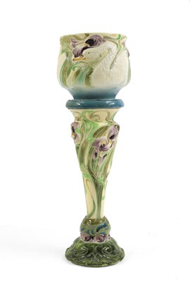 Lot 250 - A Bretby pottery jardinière on stand