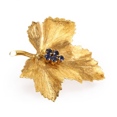 Lot 114 - A textured gold sapphire set maple leaf pin, by Tiffany & Co.