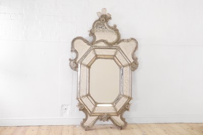 Lot 487 - A large Venetian moulded and etched glass wall mirror