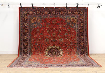 Lot 283 - A Sarouk carpet