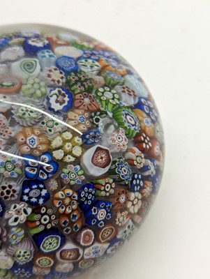 Lot 279 - A Baccarat close-packed millefiori glass paperweight