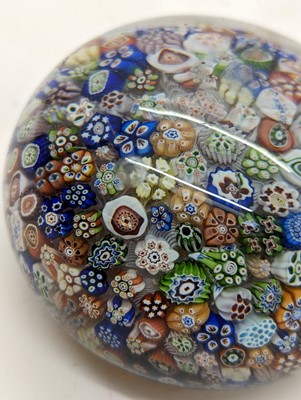 Lot 279 - A Baccarat close-packed millefiori glass paperweight