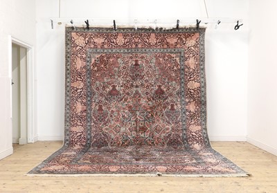 Lot 290 - A wool and silk carpet