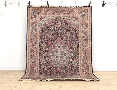 Lot 289 - A Persian-style wool and silk rug