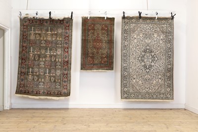 Lot 288 - Three wool and silk rugs