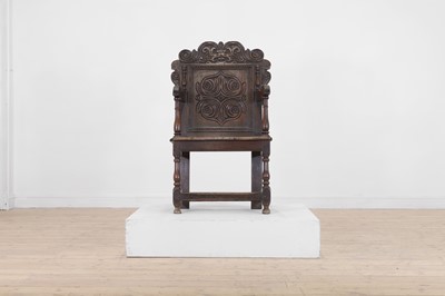 Lot 201 - An oak wainscot chair