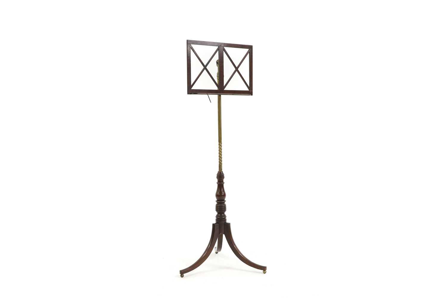 Lot 566 - A George III mahogany and brass music stand