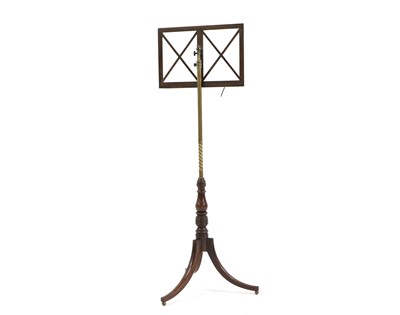 Lot 566 - A George III mahogany and brass music stand