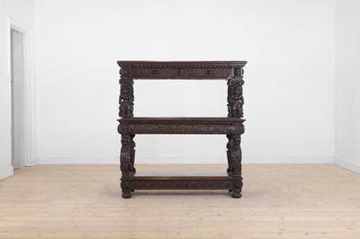 Lot 618 - An oak three-tier buffet