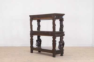 Lot 618 - An oak three-tier buffet