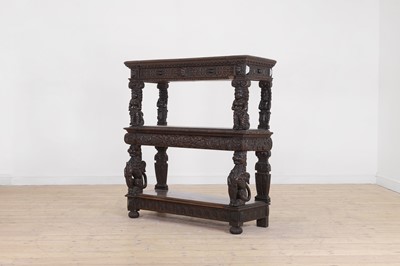 Lot 618 - An oak three-tier buffet