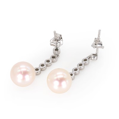 Lot 152 - A pair of white gold diamond and cultured pearl drop stud earrings