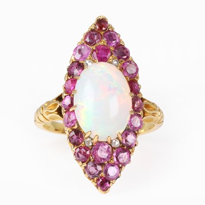 Lot 151 - An opal, ruby and pink sapphire marquise form ring