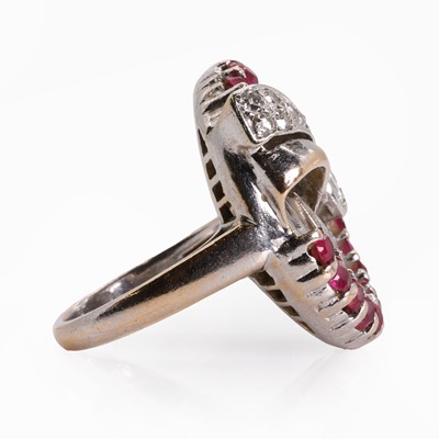 Lot 78 - A diamond and synthetic ruby swirl design ring, c.1940-1950
