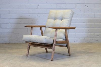 Lot 251 - A Danish oak 'GE 240 Cigar' armchair