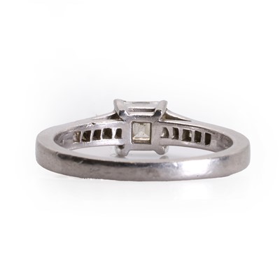 Lot 170 - A platinum single stone diamond ring with diamond set shoulders