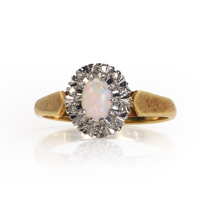 Lot 97 - An 18ct gold opal and diamond cluster ring