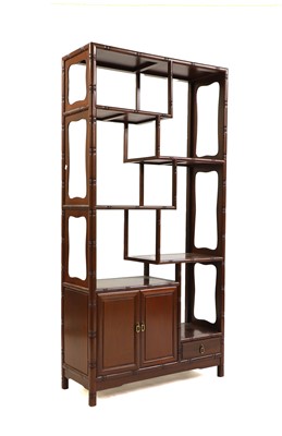 Lot 527 - A Chinese hardwood etagere