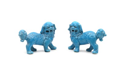 Lot 174 - A pair of Chinese blue-glazed figurines