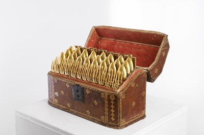 Lot 424 - A canteen of gilt copper flatware