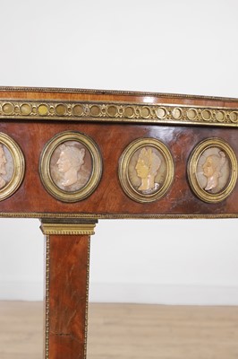 Lot 554 - A pair of neoclassical mahogany and ormolu pier tables