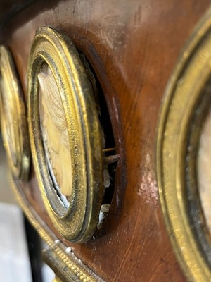 Lot 554 - A pair of neoclassical mahogany and ormolu pier tables