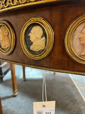 Lot 554 - A pair of neoclassical mahogany and ormolu pier tables