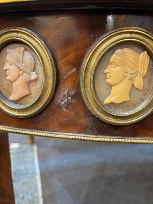 Lot 554 - A pair of neoclassical mahogany and ormolu pier tables