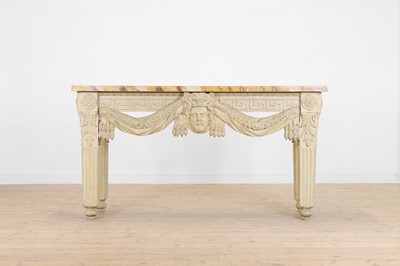 Lot A George II-style carved and painted pine console table in the manner of William Kent